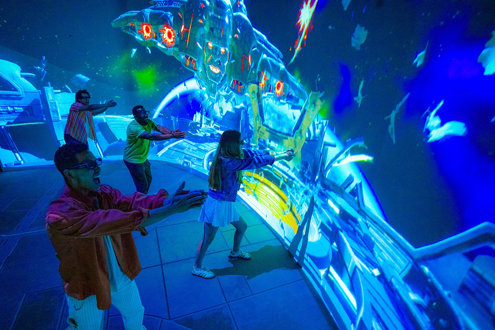 Game players are doing the thunder clap in the gaming experience.
